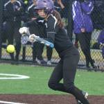 LWs Adelaide Sapirstein bunts her way aboard base against Bainbridge. She stole second and Emma Rosendal tripled her home. Andy Nystrom / staff photo