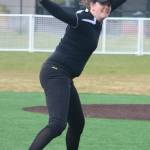 Lake Washingtons Jane Wilson mows down her Bainbridge opponent. Andy Nystrom / staff photo