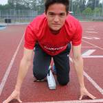 Juanita High senior Ryan Greenwalt gets set in his running block during practice. Andy Nystrom / staff photo