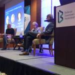 (Left to right) Jane Broom, Microsoft Philanthropies senior director, former Washongton Gov. Christine Gregoir, who now serves as CEO of Challenge Seattle, and Charlie Davis, partner and managing director at the Boston Consulting Group, speak on Microsofts $500 million commitment to affordable housing at a panel discussion during a Bellevue Downtown Association breakfast. Kailan Manandic / staff photo
