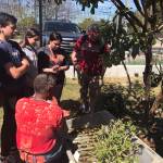 Photo courtesy of Nick Wold/Mercer Island High School                                 Students from Mercer Island High Schools Margins program met with various nonprofit organizations in Los Angeles, including Watts Towers, where they speak with a representative about the organizations sustainable garden.