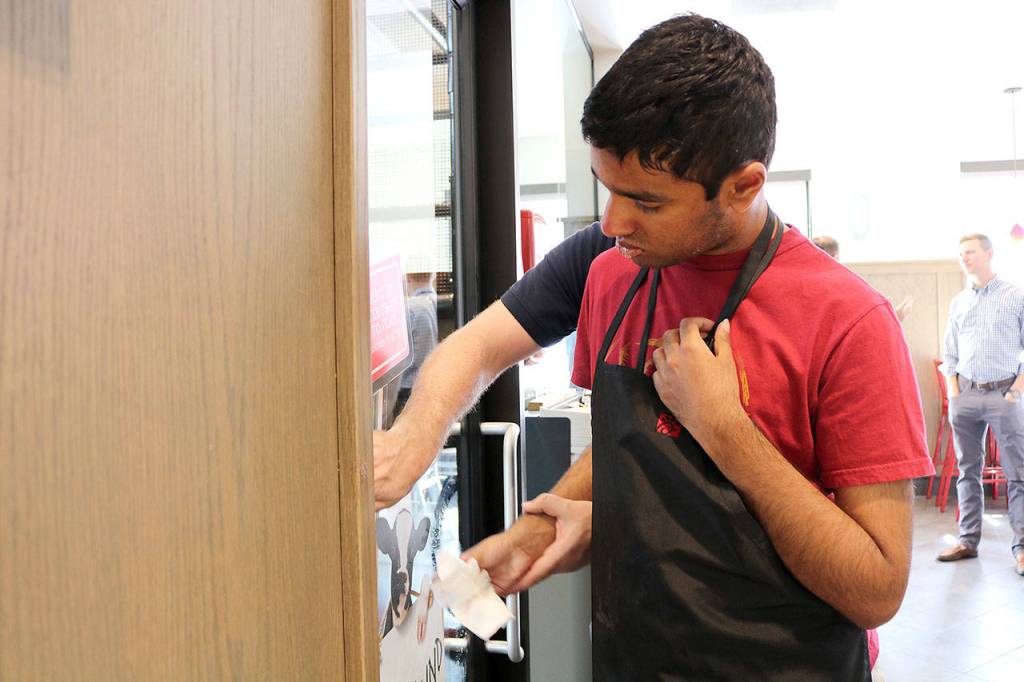 Nineteen-year-old Siddharth Srinivasan works at Chick-fil-A twice a week for one hour. He has developed great skills. Stephanie Quiroz/staff photo