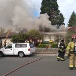 A two-home house fire on June 26 displaced two families in Totem Lake. Community members are raising funds to help their neighbors. Aaron Kunkler/staff photo