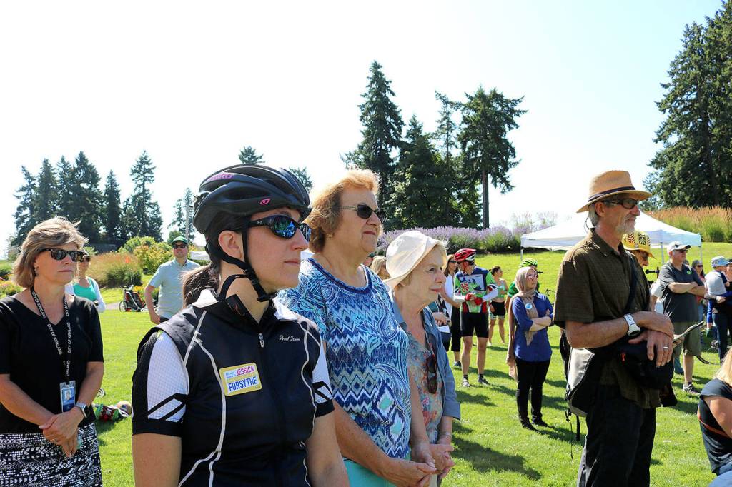 Attendees listen to elected officials and community leaders speak on the new name and partnership on July 20 in Redmond. Stephanie Quiroz/staff photo