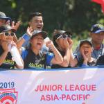 Asia-Pacific squad players from Bulacan Little League  Norzagaray, Philippines  enjoy the opening ceremony on July 28. Andy Nystrom/ staff photo
