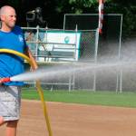 Grooming the diamond at the Junior League Softball World Series