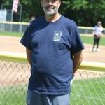 Junior League Softball World Series umpire in chief Ron Kellie of Kirkland stands near an Everest Park field on July 30 in between games of the series. Andy Nystrom/ staff photo