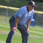 Stan Ball umpires the Washington/Central Junior League Softball World Series game on July 30 at Everest Park. Andy Nystrom/ staff photo