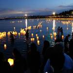 Friends and family gathered at the 1000 Lights Water Lantern Festival at Juanita Beach Park on Aug. 10. Stephanie Quiroz/staff photo