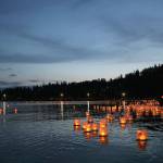 Water lanterns float on Juanita Bay at the 1,000 Lights Water Lantern Festival at Juanita Beach Park on Aug. 10. Stephanie Quiroz/staff photo