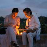 Festival attendees build a lantern at Juanita Beach Park on Aug. 10. Stephanie Quiroz/staff photo