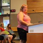 Madison Miller/staff photo                                Melody Kieffer, an office manager at Laura Ingalls Wilder Elementary School, addresses the school board on Monday.