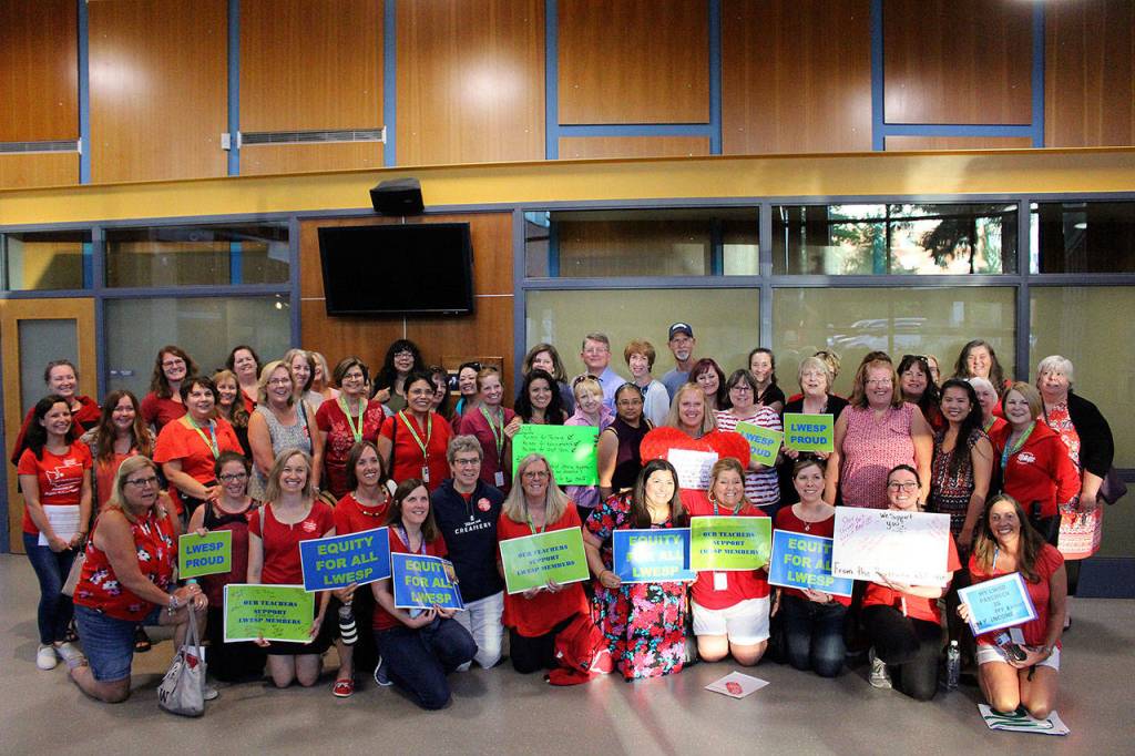 About 50 LWEA and LWESP members gather to support LWESP at Mondays school board meeting. Madison Miller/staff photo