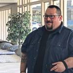 Josh Crull, manager at The 6 Day Mattress Store in Redmond, can help you find the right bed for your needs and comfort. Photo by Pili Linares