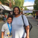 Rose Hill Elementary School fourth-grader Jackson Gallop completed his first 5K run at the Overlake Labor Day Half at Redmond Town Center. Hes pictured with his mom, Brenda Leaks. Gallop finished the race in 40 minutes and ran as part of his training to become a martial arts black belt. He plans to continue running at the Wonder Woman race on Oct. 6 at Marymoor Park. Photo courtesy of Hilary Benson