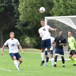 Northwest Universitys Leon Bormann goes up for a header during the recent alumni match. Also pictured from left to right are Payton Gunhus, Dylan Murphy, Tristan Gautney, Obi Esonu and goalkeeper Alex Thiehofe from Germany. Photo courtesy of Ray Fink