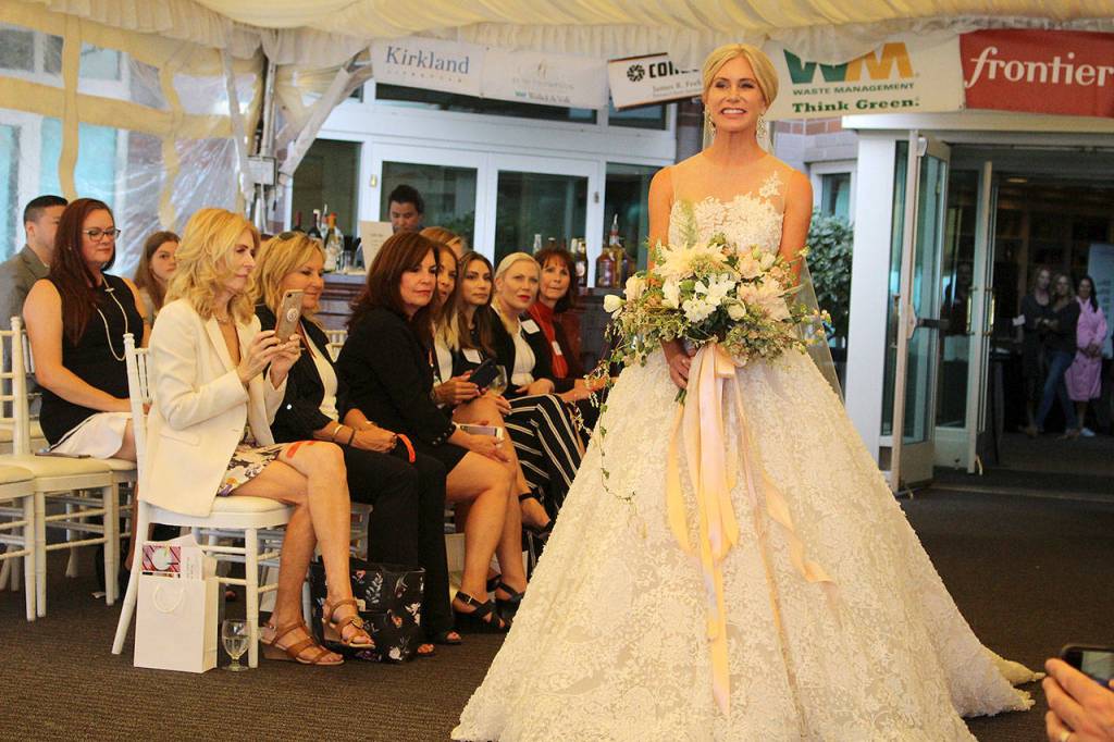 Heather Caterson models Nyanza Bridal at the Kirkland Chamber of Commerces sustainable fashion show on Sept. 12. Madison Miller/staff photo