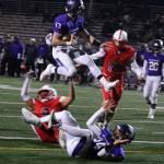 Lake Washingtons Jakson Voelker leaps into the end zone. Andy Nystrom/ staff photo