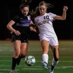 Lake Washington sophomore Abby Nikfard (left) and Bellevue junior Zoe Fowler both go for the ball during the 3A KingCo championship game on Nov. 5. Photo courtesy of Stephanie Ault Justus