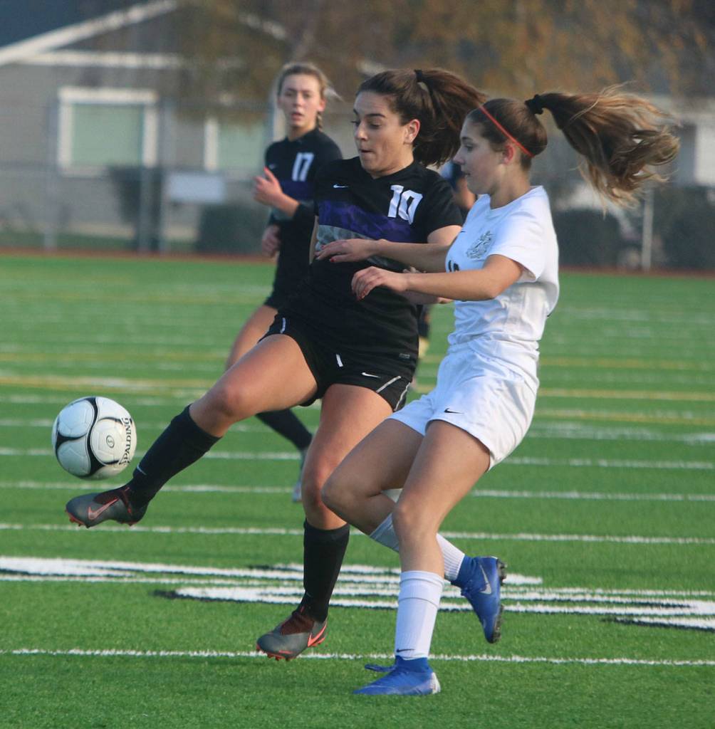 Abby Nikfard, middle, and Bella Davis, back.
