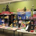 The JHS alumni group raised $1,000 and hundreds of toys at last years Hopelink toy drive. Photo courtesy of Jill Jordan