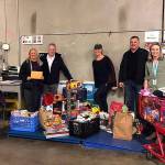 Photo courtesy of Jill Jordan                                 Last years Hopelink toy drive with JHS alumni.