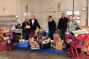 Photo courtesy of Jill Jordan                                 Last years Hopelink toy drive with JHS alumni.