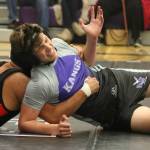 Lake Washingtons Max Reisman works his way out of a hold against his Sammamish foe on Dec. 5 at Lake Washington High. Reisman won, 10-6, in the 138-pound match. Andy Nystrom/ staff photo