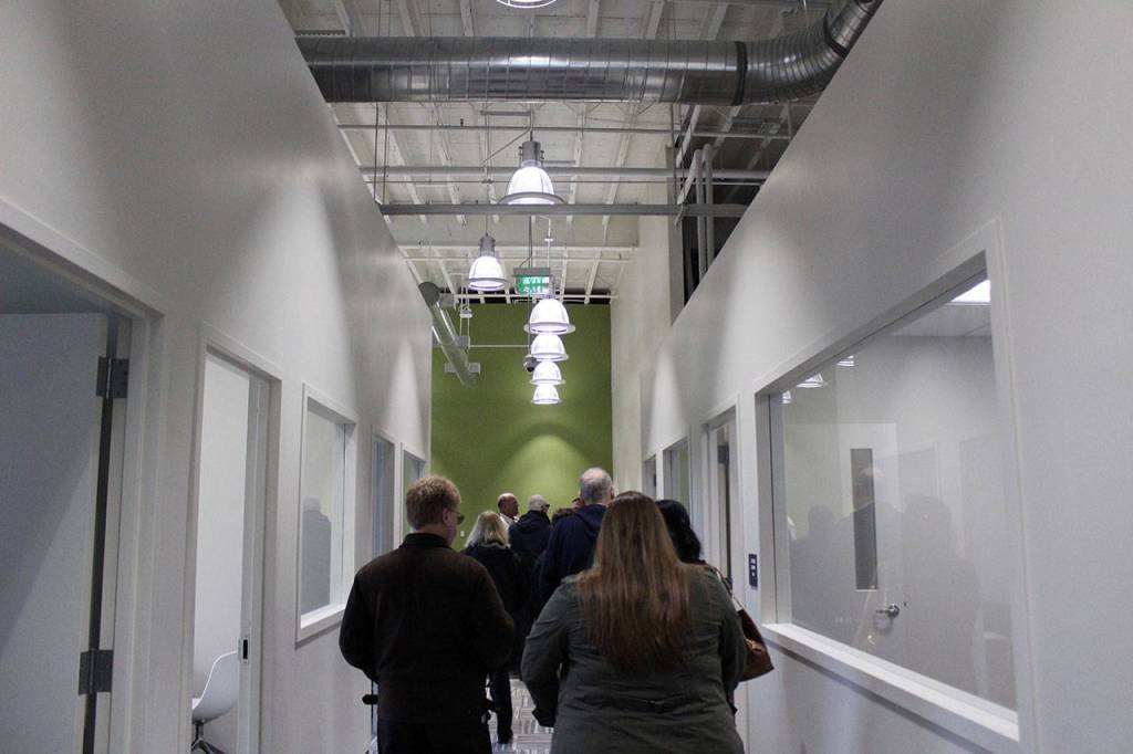 Attendees walking through the facilitys renovated halls. Blake Peterson/staff photo