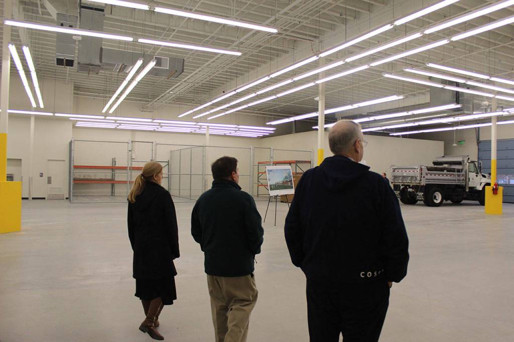 Kirkland officials check out the garage at the center. In total, the building takes up 25,000 square feet. Blake Peterson/staff photo
