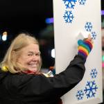 Kirkland mayor Penny Sweet flipped the switch to turn on 25,000 LEDs programmed to holiday music by Google Kirkland engineers. Photo courtesy of Aaron Jacob