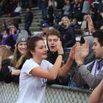 Lake Washingtons Alex Mueller slaps hands with friends after winning the 3A state girls soccer title. Andy Nystrom/ staff photo