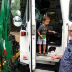 Mike Weinstein (right) with his grandson Owen at a take-your-children-to-work day event in Kirkland. Photo courtesy of Waste Management