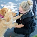Animal Control officer Jennifer Matison with some community pets at a recent event. Photo courtesy city of Kirkland