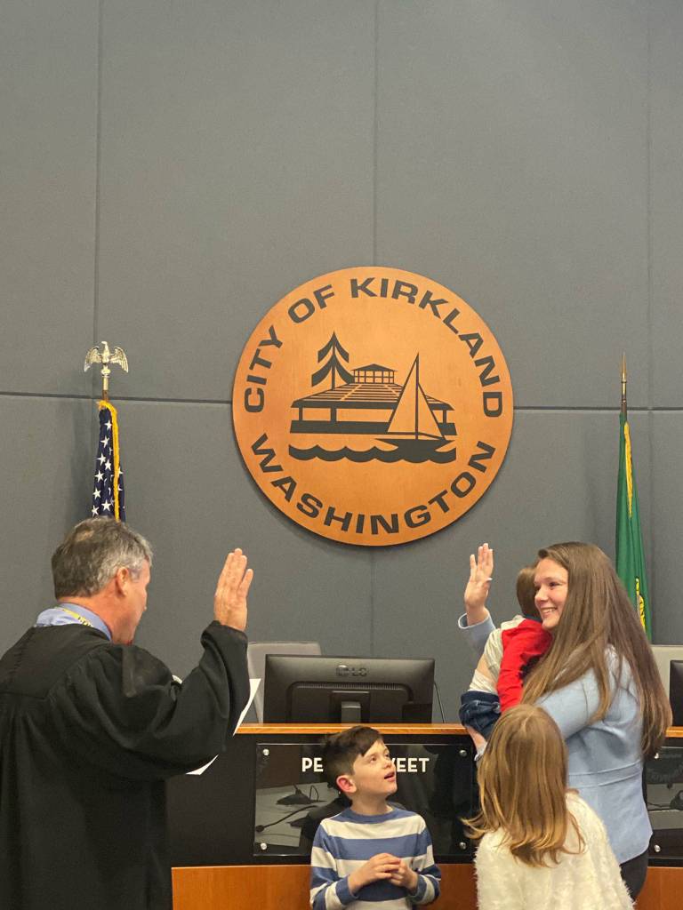 New councilmember Amy Falcone, accompanied by her children, being sworn in. Photo courtesy city of Kirkland