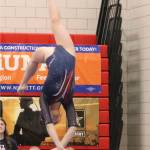Juanita gymnast Daphanie Chan competes on the beam during the first day of competition at the 1A/2A/3A state gymnastics meet on Feb. 20 at Sammamish High School. Benjamin Olson/staff photo