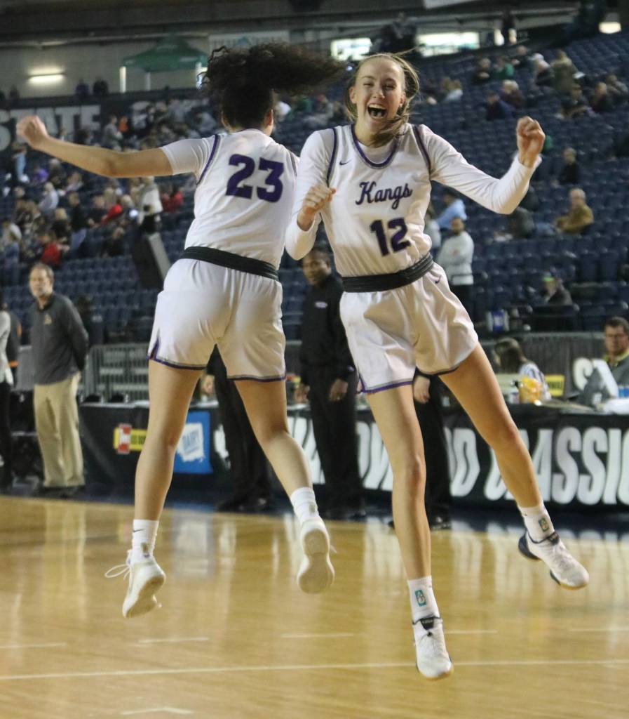 Elise Hani, right, leaps into Emma Boctor during introductions. Andy Nystrom/ staff photo