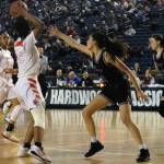 Lake Washingtons Sophia Liesse, right, plays strong defense against Eastside Catholics Zaza Walton on Friday night in the semifinals. Andy Nystrom/ staff photo