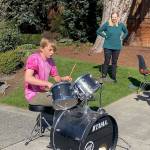 Photo courtesy of Meenakshi Sinha                                 From left, Kirkland residents Nick Davis and Silvia Bajardi play their instruments at a neighborhood music event March 15.