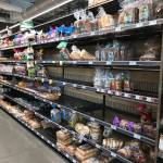 Sections of the bread aisle at the Whole Foods in Kirkland were cleared out on March 15. Samantha Pak/staff photo