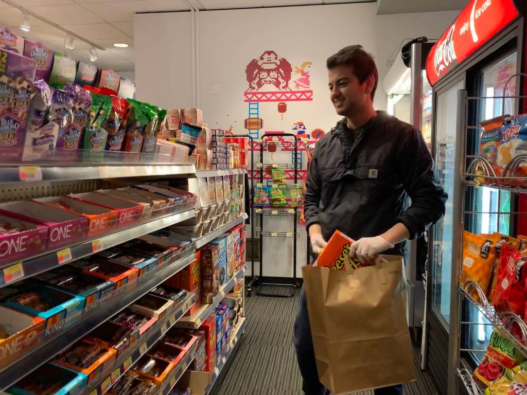 Alex Comair, director of operations, shops at the DigiPen student store for a delivery. Photo courtesy of DigiPen Institute of Technology