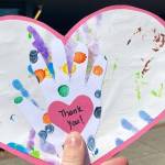 Photos: Students give thank you cards to local health workers