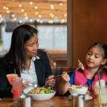 Co-owner Yuie Wiborg and her daughter, Kyla. Soi Kirkland offers kids under 14 a free bowl of egg or rice noodles with steamed chicken. Courtesy photo/Suzi Pratt for Soi Restaurant