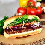 The Banh Mi Burger contains a lemongrass patty, pickled daikon carrots, pickled red cabbage, cilantro, jalapenos, plant-based mayonnaise, cucumber, umami sauce, and fresh cracked pepper. Courtesy of Plantiful Superfoods.