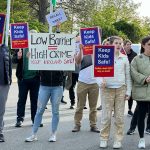Keep Kids Safe protestors hold signs outside of Kirkland City Hall on May 17. Courtesy of Lee Keller.