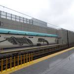 A metal-cut mural depicting a Dragon and Phoenix lines the Spring District Station, situated between the Wilburton and RedBell stations. This mural, created by Chinese-indigenous artist Louie Gong, is a mixture of Coast Salish and Chinese paper-cutting designs. According to Gong, this art represents the experience of mixed-race people. (Cameron Sires/Sound Publishing)