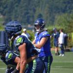 Seattle Seahawks Quarterback Sam Darnold looks left in a drill at training camp. Ben Ray / Sound Publishing.