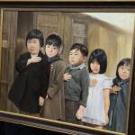 Children were among those imprisoned because of their nationality and ethnicity during WWII in the United States, as shown in this painting by Chris Hopkins. Photo by Bailey Jo Josie/Sound Publishing